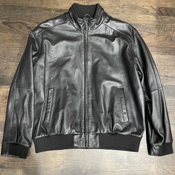 Like new black super soft lamb skin leather jacket. Size XL with 5 pockets.